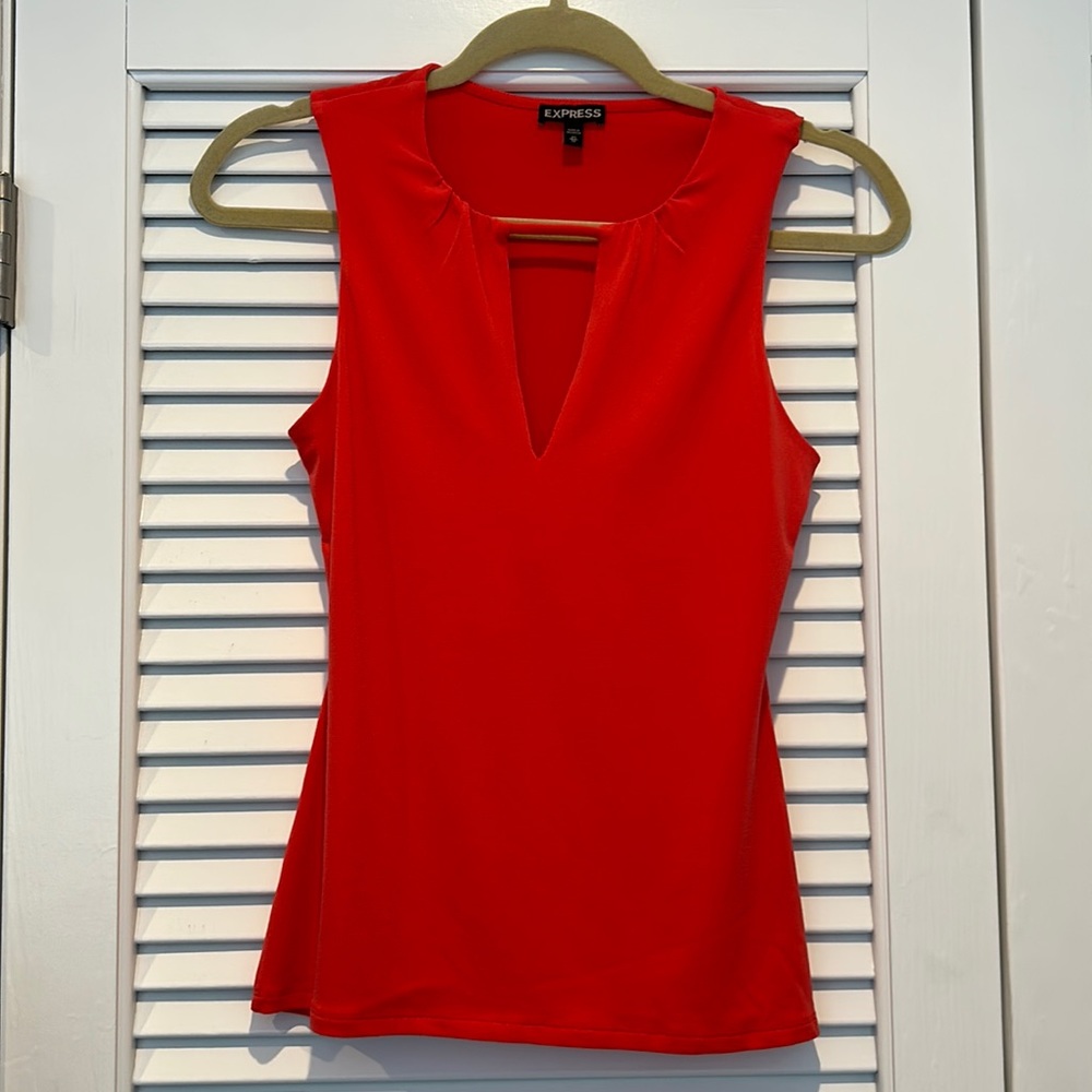 XS Express Cut out Sleeveless Blouse